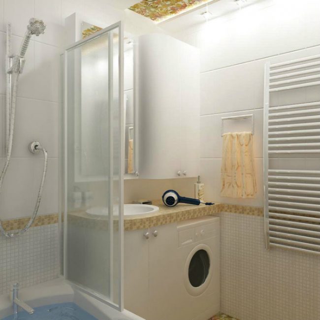 Маленький уголок в ванной комнате под стиральную машину и небольшую раковину, встроенную в столешницу