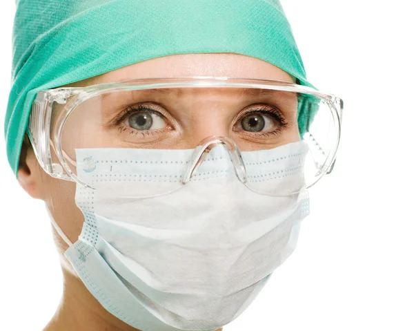 Хирург женщина в защитные очки и маски — стоковое фото